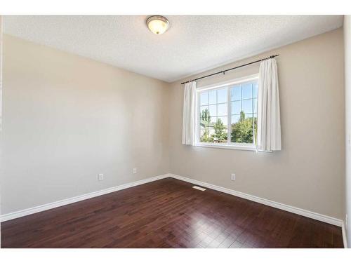 73 Rocky Ridge Heath Nw, Calgary, AB - Indoor Photo Showing Other Room