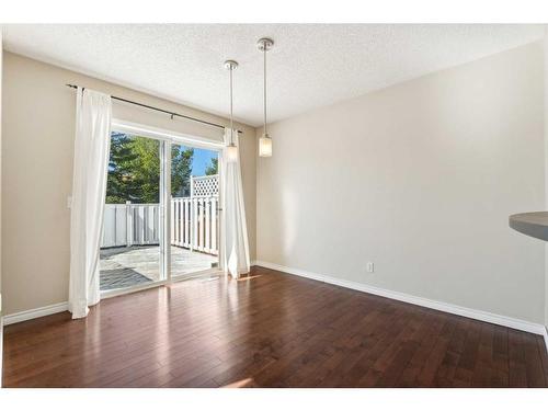 73 Rocky Ridge Heath Nw, Calgary, AB - Indoor Photo Showing Other Room