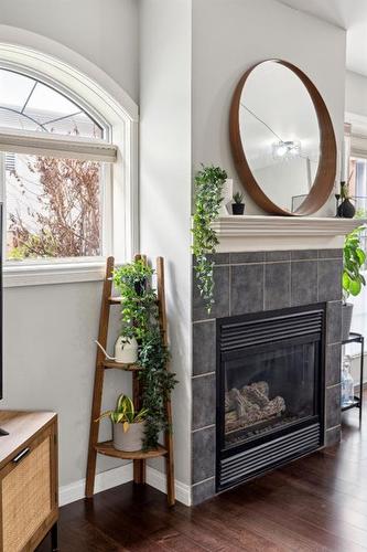 111-923 15 Avenue Sw, Calgary, AB - Indoor Photo Showing Living Room With Fireplace