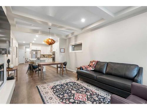 336 Marina Cove Se, Calgary, AB - Indoor Photo Showing Living Room With Fireplace