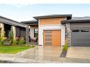 336 Marina Cove Se, Calgary, AB  - Outdoor With Facade 