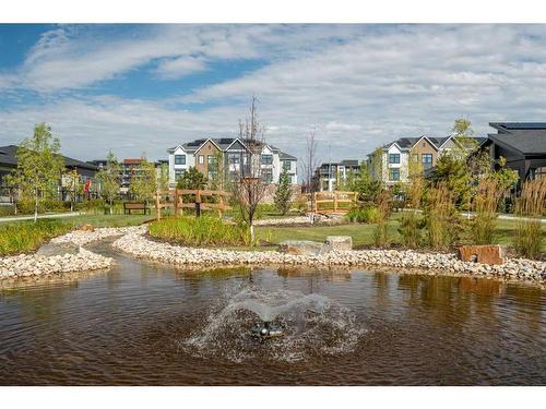 336 Marina Cove Se, Calgary, AB - Outdoor With Body Of Water With View