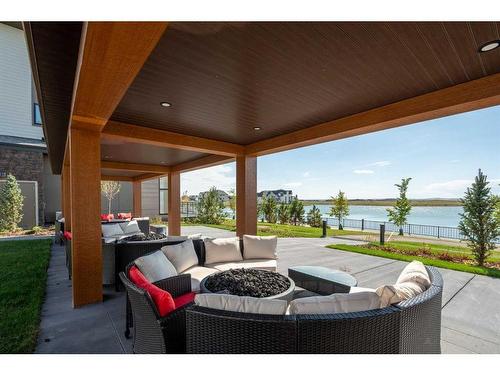 336 Marina Cove Se, Calgary, AB - Outdoor With Body Of Water With Exterior