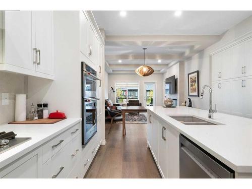 336 Marina Cove Se, Calgary, AB - Indoor Photo Showing Kitchen With Double Sink With Upgraded Kitchen