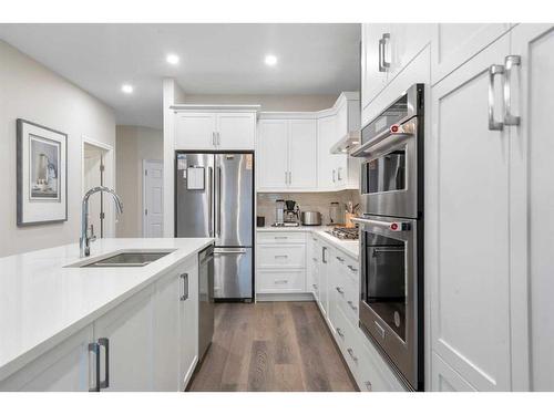 336 Marina Cove Se, Calgary, AB - Indoor Photo Showing Kitchen With Double Sink With Upgraded Kitchen