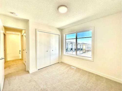 509-857 Belmont Drive Sw, Calgary, AB - Indoor Photo Showing Other Room