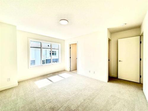 509-857 Belmont Drive Sw, Calgary, AB - Indoor Photo Showing Other Room