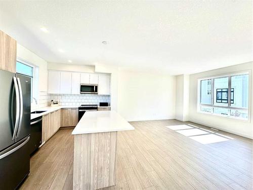 509-857 Belmont Drive Sw, Calgary, AB - Indoor Photo Showing Kitchen With Stainless Steel Kitchen With Upgraded Kitchen