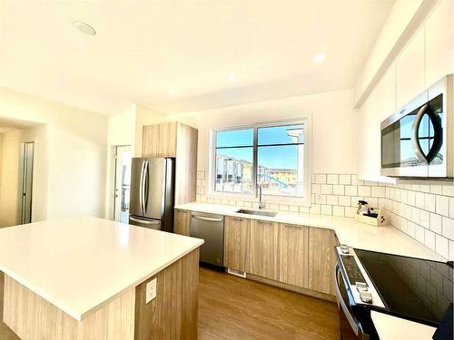 509-857 Belmont Drive Sw, Calgary, AB - Indoor Photo Showing Kitchen With Stainless Steel Kitchen With Upgraded Kitchen