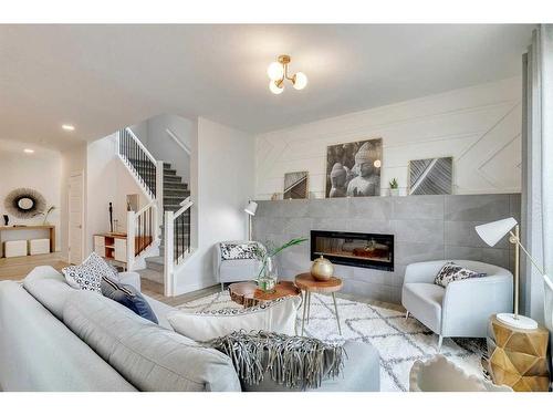 324 Legacy Circle Se, Calgary, AB - Indoor Photo Showing Living Room With Fireplace