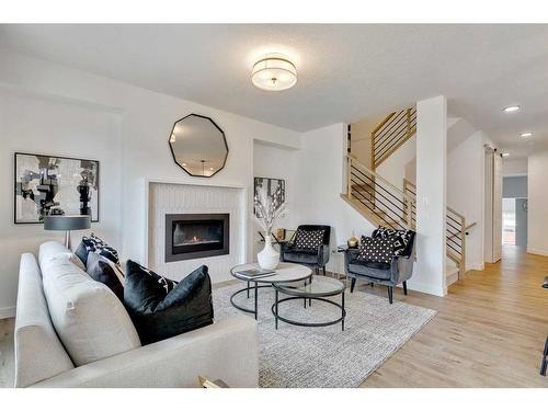 328 Legacy Circle Se, Calgary, AB - Indoor Photo Showing Living Room With Fireplace