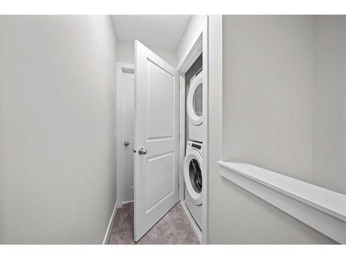 482 Canals Crossing Sw, Airdrie, AB - Indoor Photo Showing Laundry Room