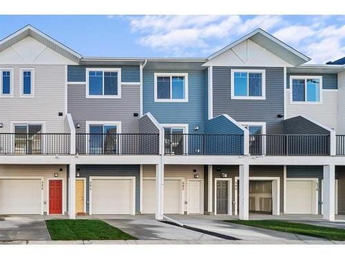 482 Canals Crossing Sw, Airdrie, AB - Outdoor With Balcony With Deck Patio Veranda With Facade