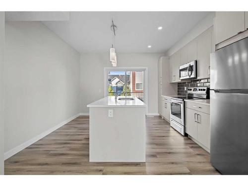 482 Canals Crossing Sw, Airdrie, AB - Indoor Photo Showing Kitchen