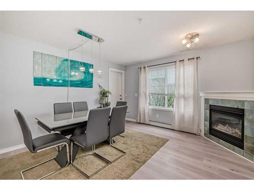 203-15320 Bannister Road Se, Calgary, AB - Indoor With Fireplace