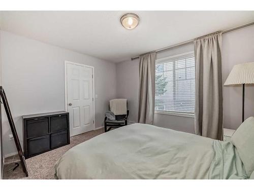 203-15320 Bannister Road Se, Calgary, AB - Indoor Photo Showing Bedroom