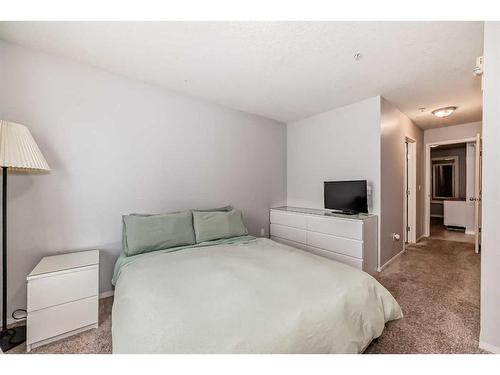 203-15320 Bannister Road Se, Calgary, AB - Indoor Photo Showing Bedroom