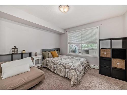 203-15320 Bannister Road Se, Calgary, AB - Indoor Photo Showing Bedroom