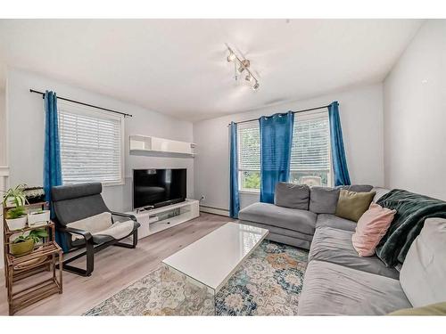 203-15320 Bannister Road Se, Calgary, AB - Indoor Photo Showing Living Room