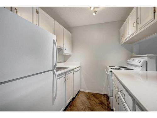 201-1311 15 Avenue Sw, Calgary, AB - Indoor Photo Showing Laundry Room