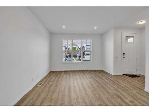 141 Corner Glen Way Ne, Calgary, AB - Indoor Photo Showing Living Room