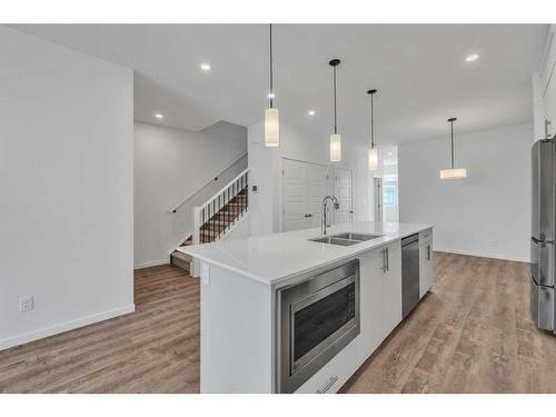 141 Corner Glen Way Ne, Calgary, AB - Indoor Photo Showing Kitchen With Double Sink With Upgraded Kitchen