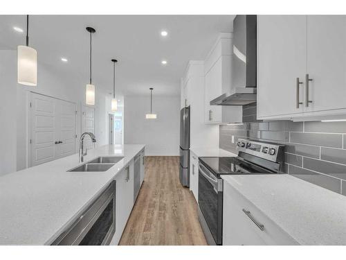 141 Corner Glen Way Ne, Calgary, AB - Indoor Photo Showing Kitchen With Stainless Steel Kitchen With Double Sink With Upgraded Kitchen