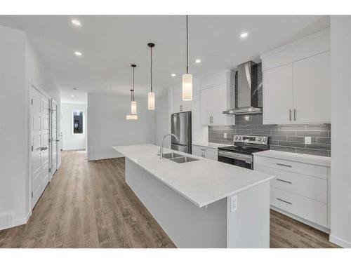 141 Corner Glen Way Ne, Calgary, AB - Indoor Photo Showing Kitchen With Double Sink With Upgraded Kitchen