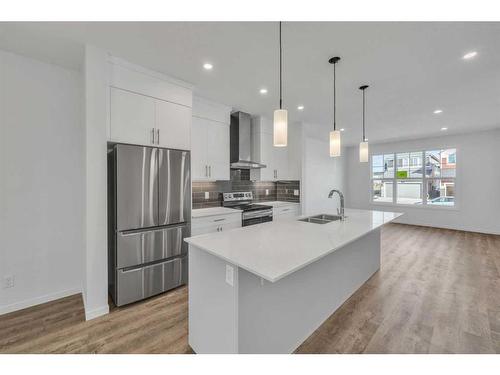 141 Corner Glen Way Ne, Calgary, AB - Indoor Photo Showing Kitchen With Stainless Steel Kitchen With Double Sink With Upgraded Kitchen