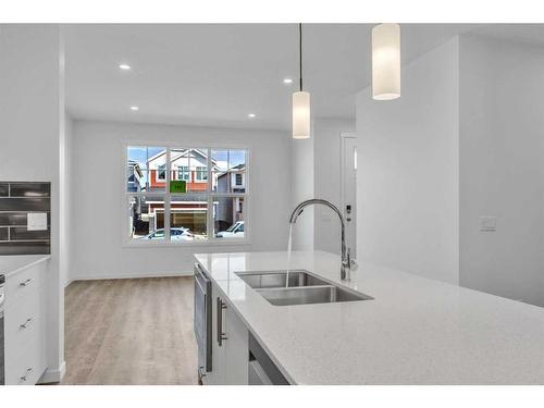 141 Corner Glen Way Ne, Calgary, AB - Indoor Photo Showing Kitchen With Double Sink With Upgraded Kitchen