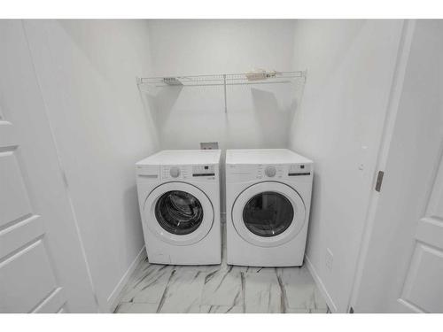 141 Corner Glen Way Ne, Calgary, AB - Indoor Photo Showing Laundry Room