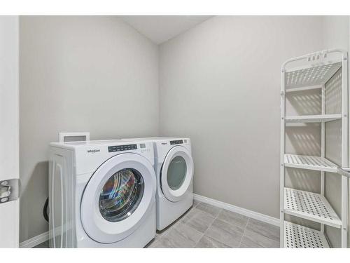 180 Cityside Park Ne, Calgary, AB - Indoor Photo Showing Laundry Room