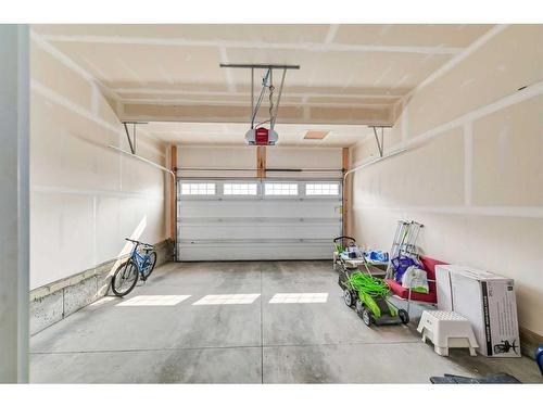 180 Cityside Park Ne, Calgary, AB - Indoor Photo Showing Garage