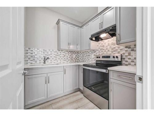 180 Cityside Park Ne, Calgary, AB - Indoor Photo Showing Kitchen With Upgraded Kitchen