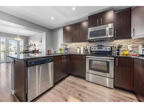 345 Windford Green Sw, Airdrie, AB - Indoor Photo Showing Kitchen