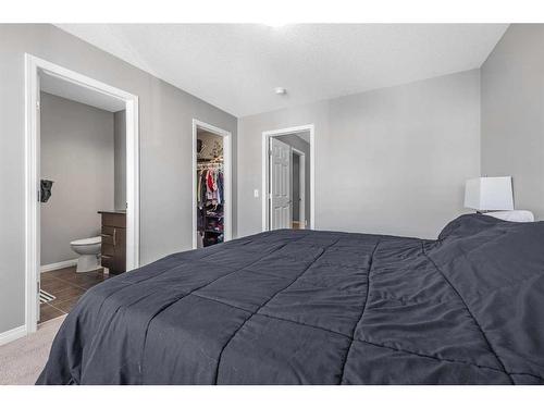 345 Windford Green Sw, Airdrie, AB - Indoor Photo Showing Bedroom