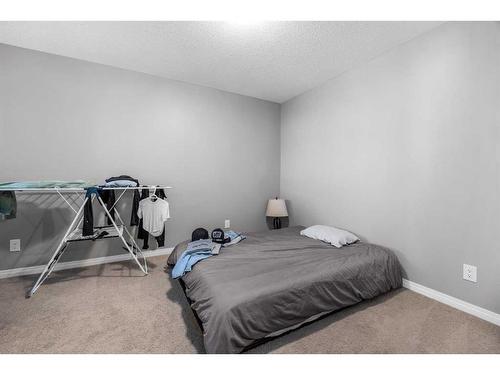 345 Windford Green Sw, Airdrie, AB - Indoor Photo Showing Bedroom