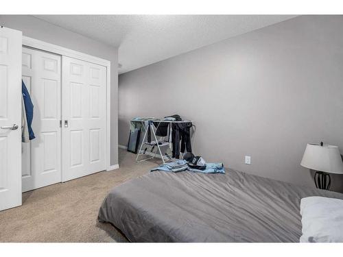 345 Windford Green Sw, Airdrie, AB - Indoor Photo Showing Bedroom