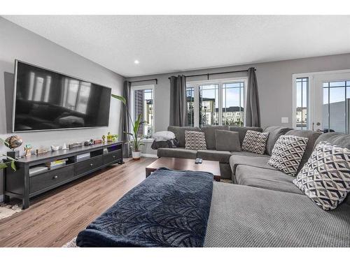 345 Windford Green Sw, Airdrie, AB - Indoor Photo Showing Living Room