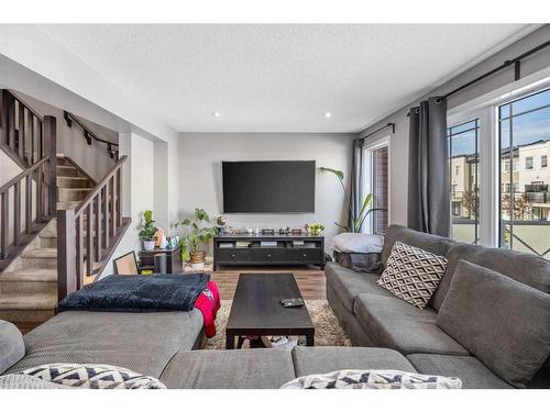 345 Windford Green Sw, Airdrie, AB - Indoor Photo Showing Living Room