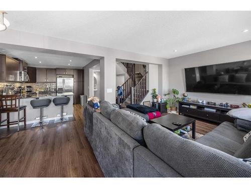 345 Windford Green Sw, Airdrie, AB - Indoor Photo Showing Living Room