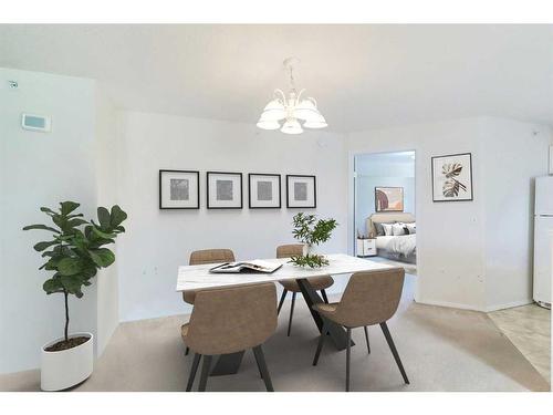 1318-6635 25 Avenue Ne, Calgary, AB - Indoor Photo Showing Dining Room