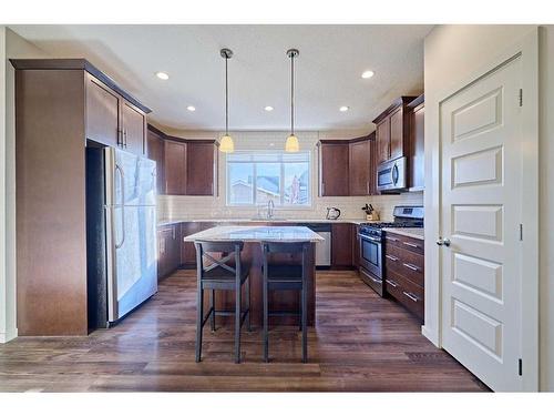 62 Marquis Common Se, Calgary, AB - Indoor Photo Showing Kitchen With Upgraded Kitchen