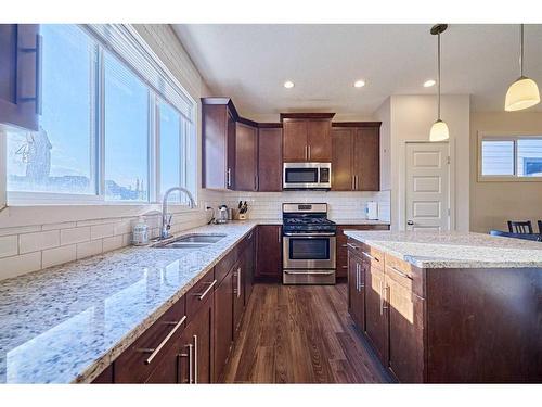 62 Marquis Common Se, Calgary, AB - Indoor Photo Showing Kitchen With Double Sink With Upgraded Kitchen