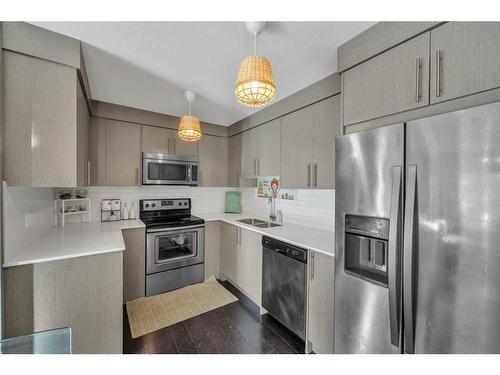 6203-302 Skyview Ranch Drive Ne, Calgary, AB - Indoor Photo Showing Kitchen With Stainless Steel Kitchen With Double Sink With Upgraded Kitchen