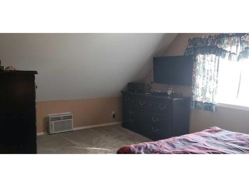 328 6 Avenue North, Champion, AB - Indoor Photo Showing Bedroom