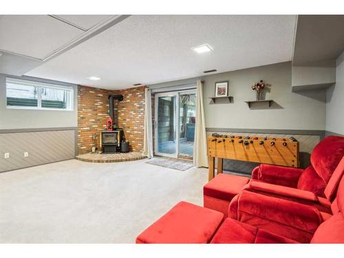 111 Edforth Place Nw, Calgary, AB - Indoor With Fireplace