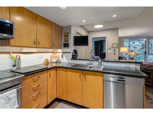 215-1108 6 Avenue Sw, Calgary, AB - Indoor Photo Showing Kitchen With Double Sink