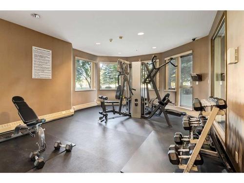 215-1108 6 Avenue Sw, Calgary, AB - Indoor Photo Showing Gym Room