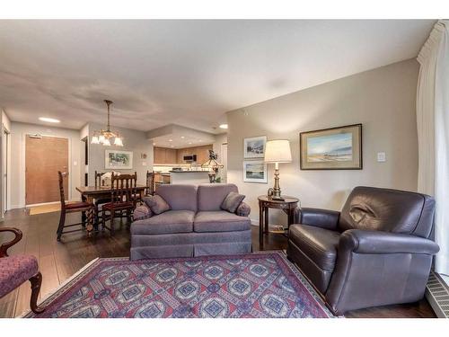 215-1108 6 Avenue Sw, Calgary, AB - Indoor Photo Showing Living Room With Fireplace